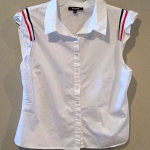 Woman used blouses size x large white with red,white and blue around arm